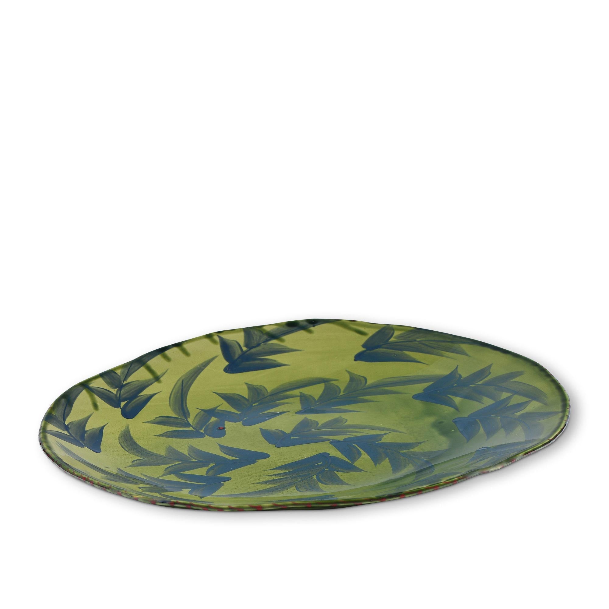 Ceramic%20Round%20Serving%20Dish%20With%20Blue%20Leaves%20Motifs%20on%20Green%20Background image 2