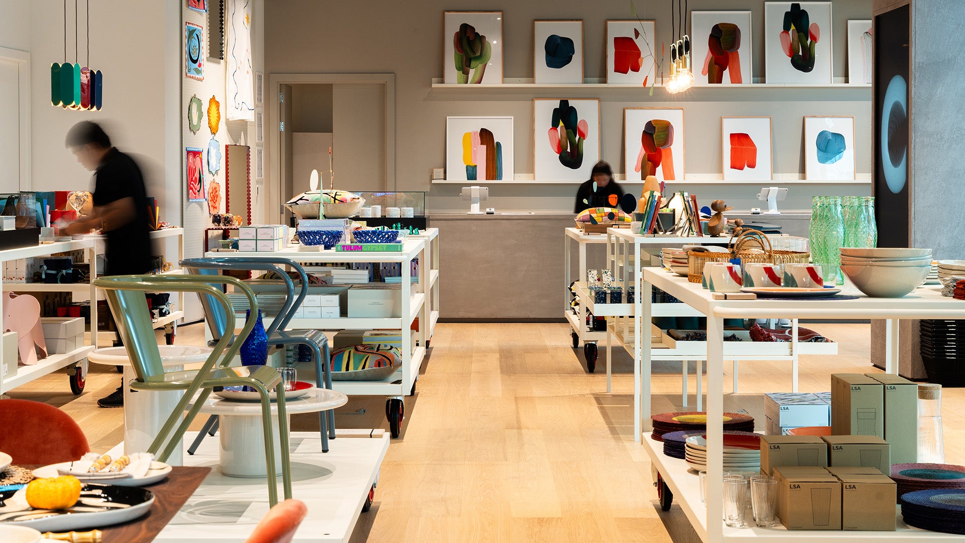 The Conran Shop store interior in Kuwait, featuring colorful modern decor, furniture, and art displays.